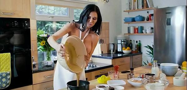  Busty chick beeing fucked while still cooking a cake